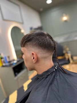 Mullet fade with a tight taper finished at Signature Hair Styles