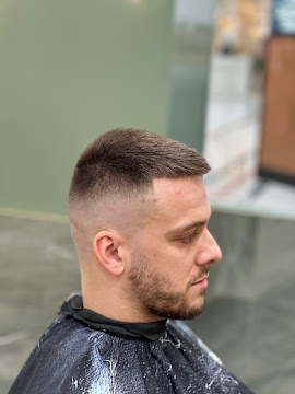 Close up of a skin fade blended through the sides at Signature Hair Styles