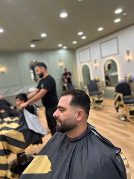 Barbers working across the shop floor at Signature Hair Styles in Hillarys