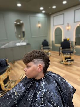 Kids textured haircut with a fade and hair design completed at Signature Hair Styles in Hillarys